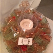 16. Tabletop wreath with battery operated pillar candle and glass holder